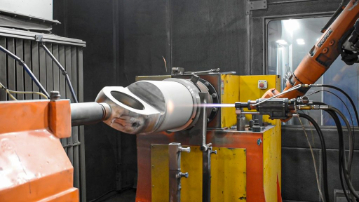 HVOF machine spraying hydraulic cylinder