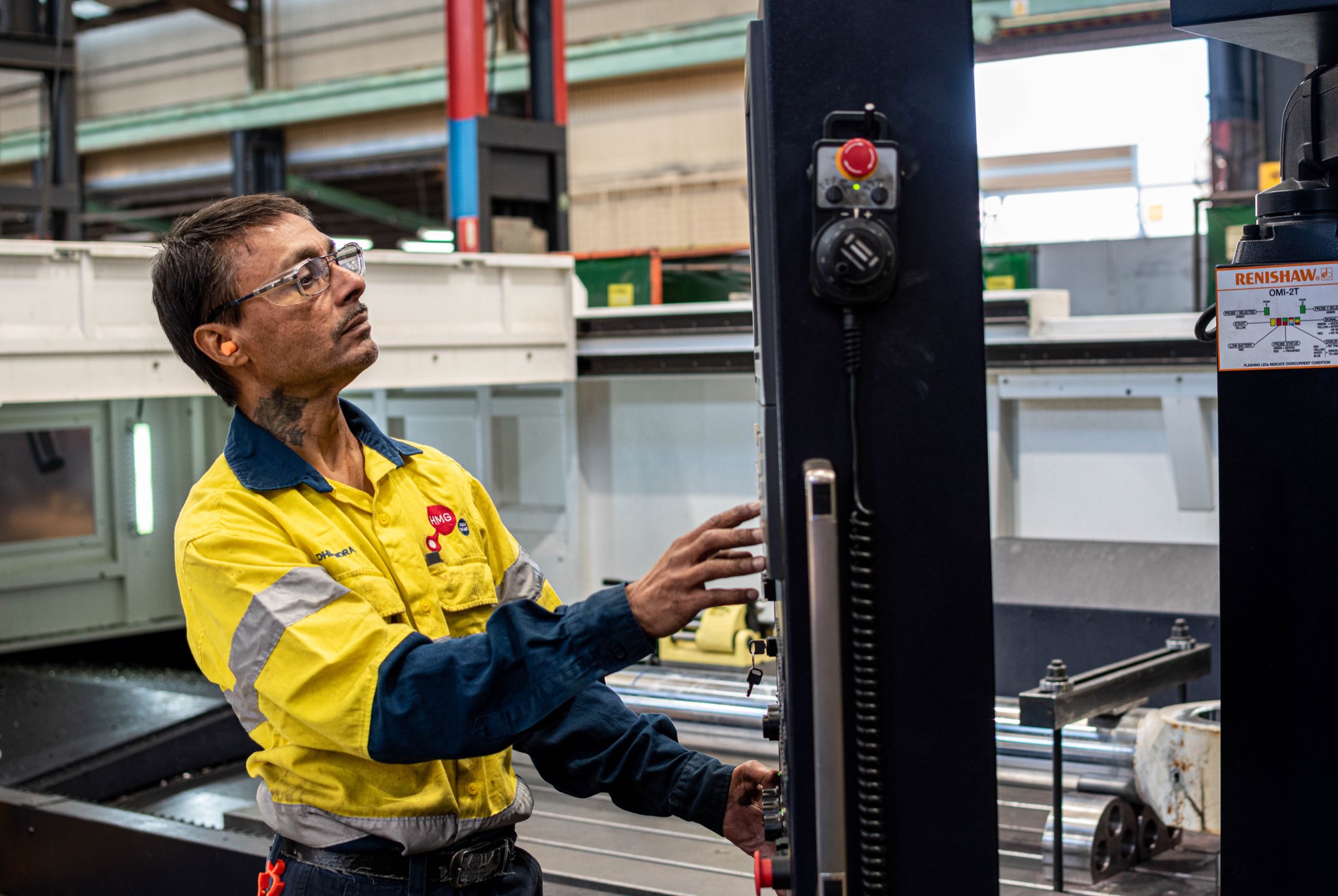 HMG Worker In Workshop